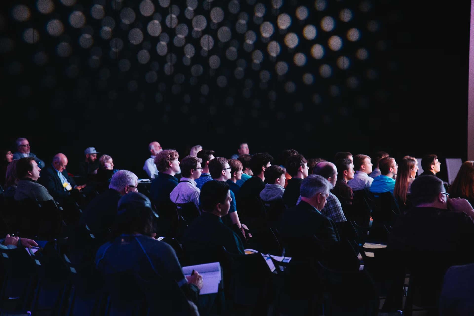 Picture of an audience looking away from the camera